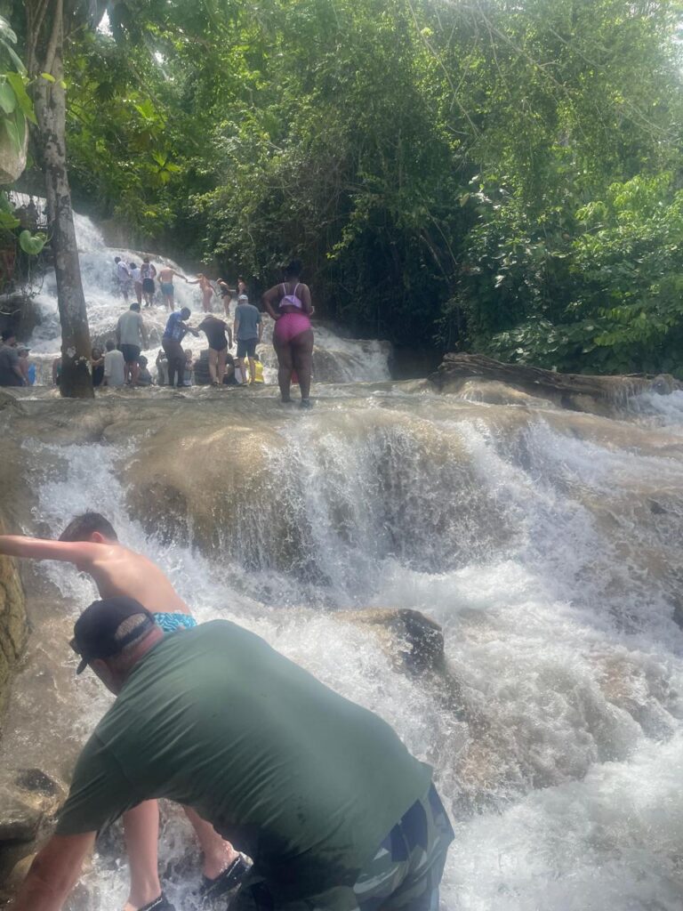Tourists climbing Dunn's River Falls in Ocho Rios, Jamaica