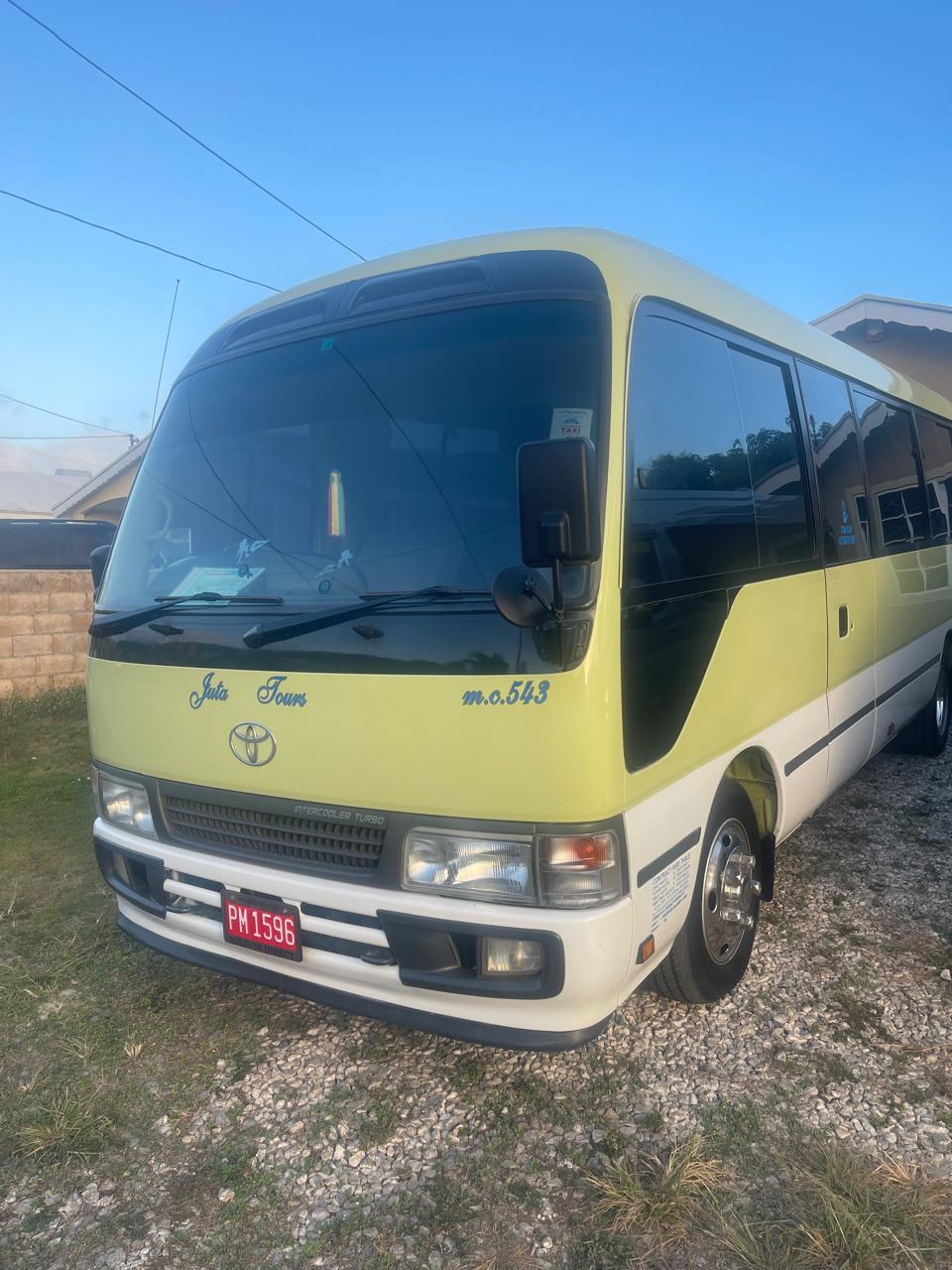 Coaster bus for group transportation in Jamaica