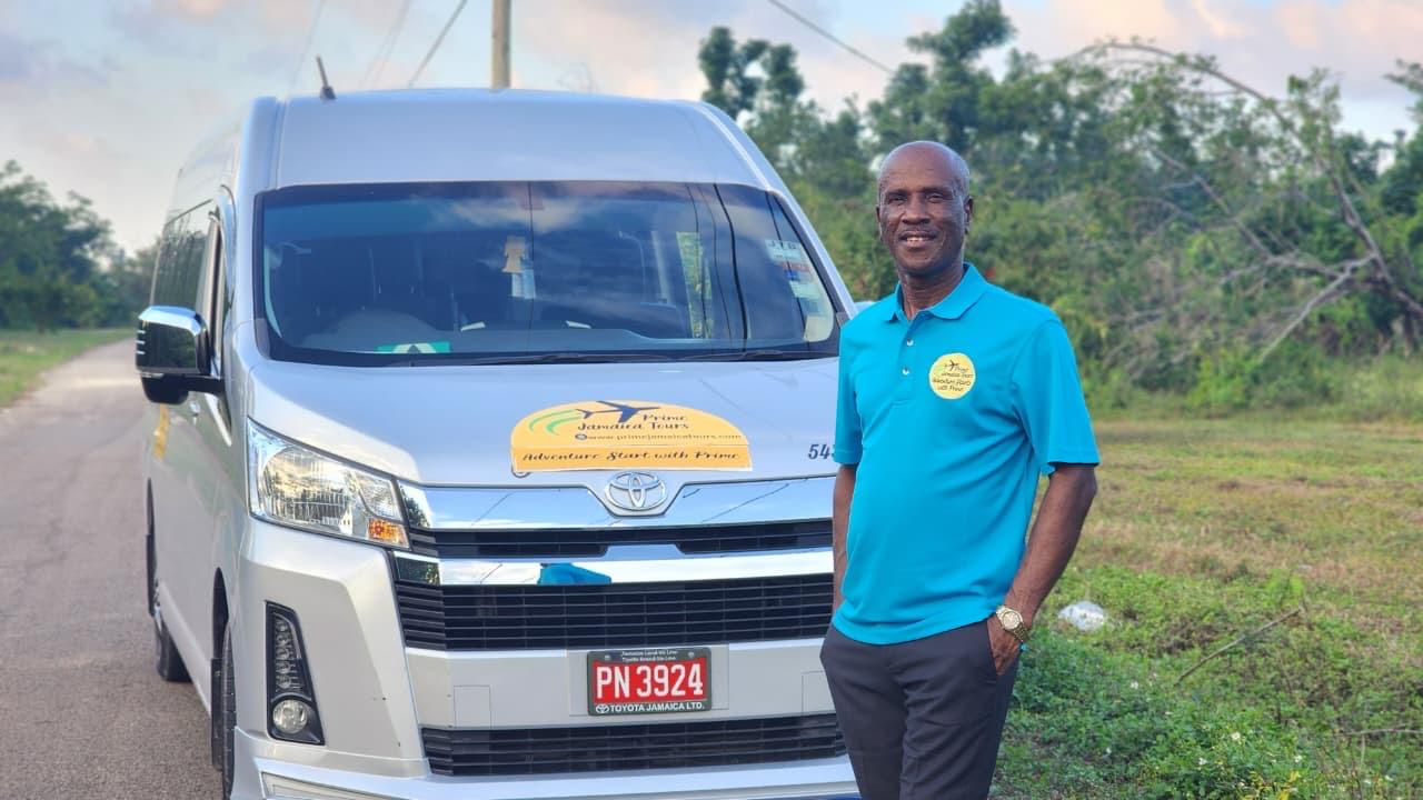 Prime Jamaica Tours driver welcoming travelers in Jamaica